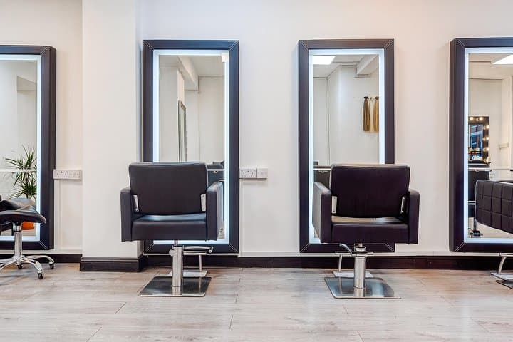 Styling chairs and mirrors along the wall